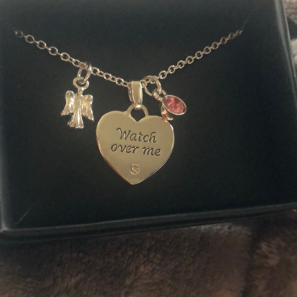 brand new Breast cancer necklace.